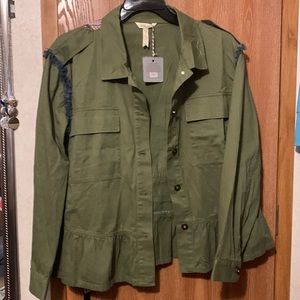 Womens new with tags. Fits like a large /X-Large.